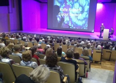 Stewart Auditorium audience and screen