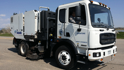 A sweeper truck