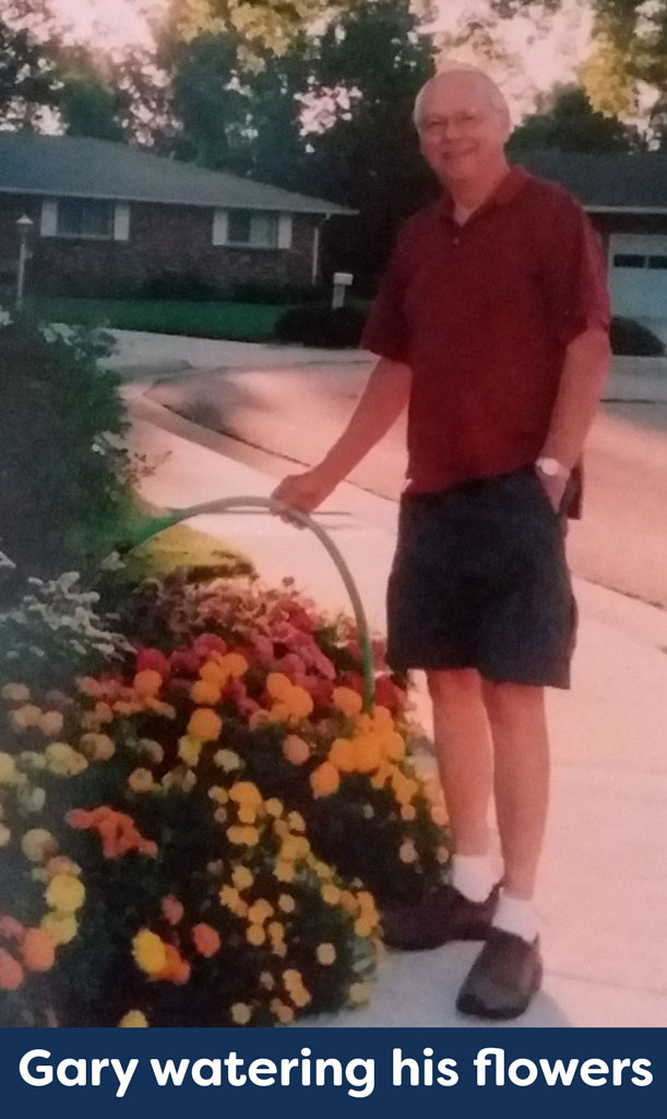 Gary-watering-his-flowers