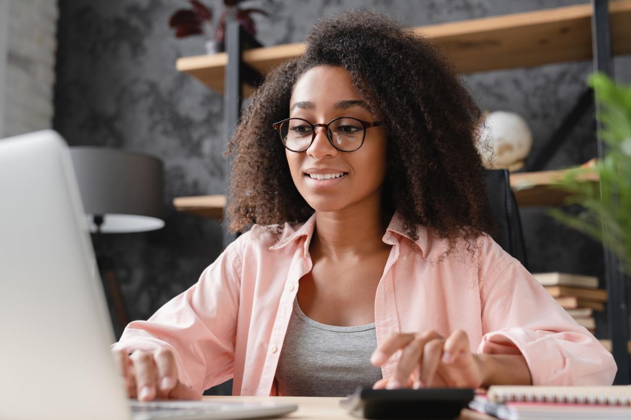 Happy woman at computer