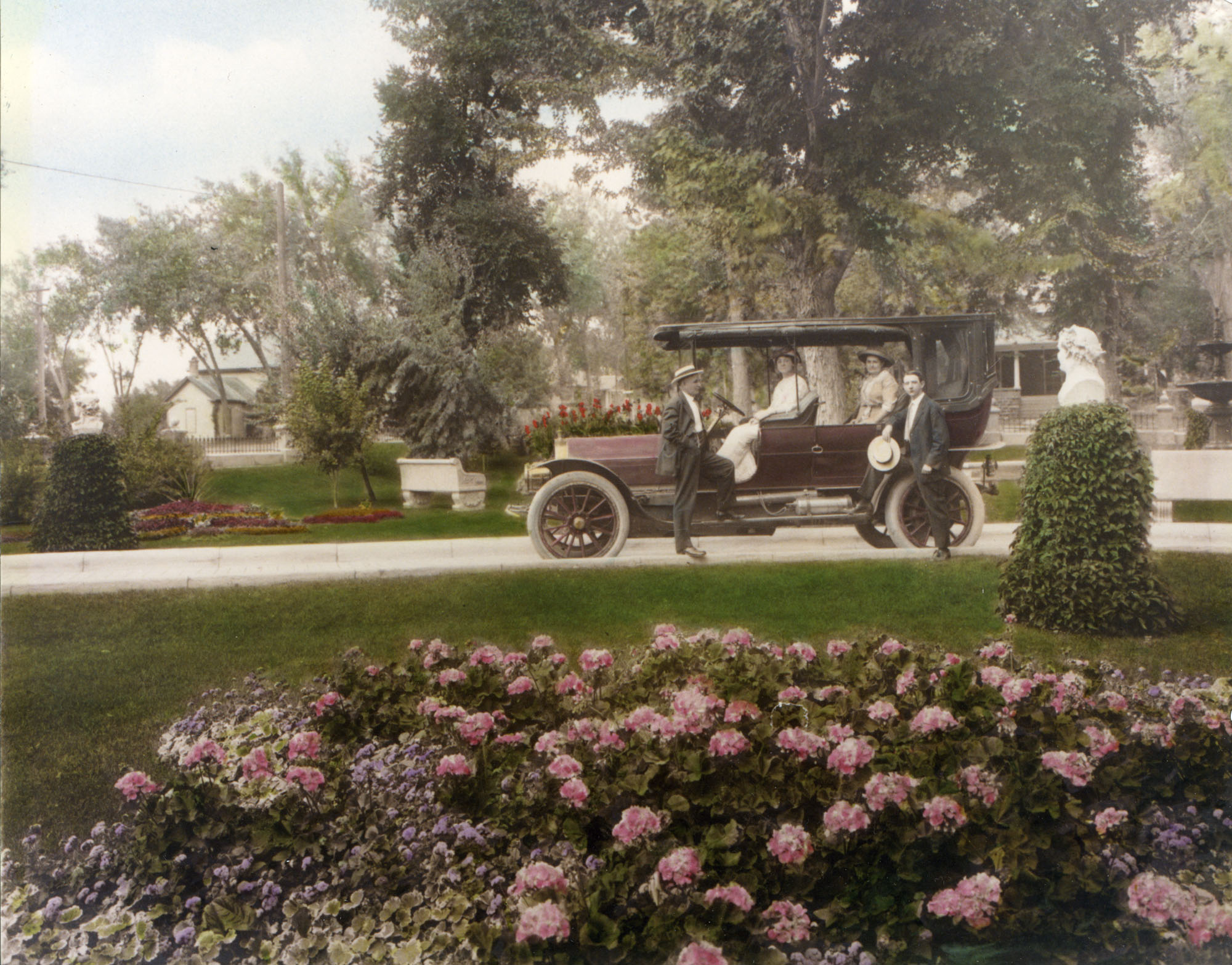 Callahans and friend with Pierce-Arrow in Gardens, c 1913, Longmont Museum Photo Archive #2008_016_005