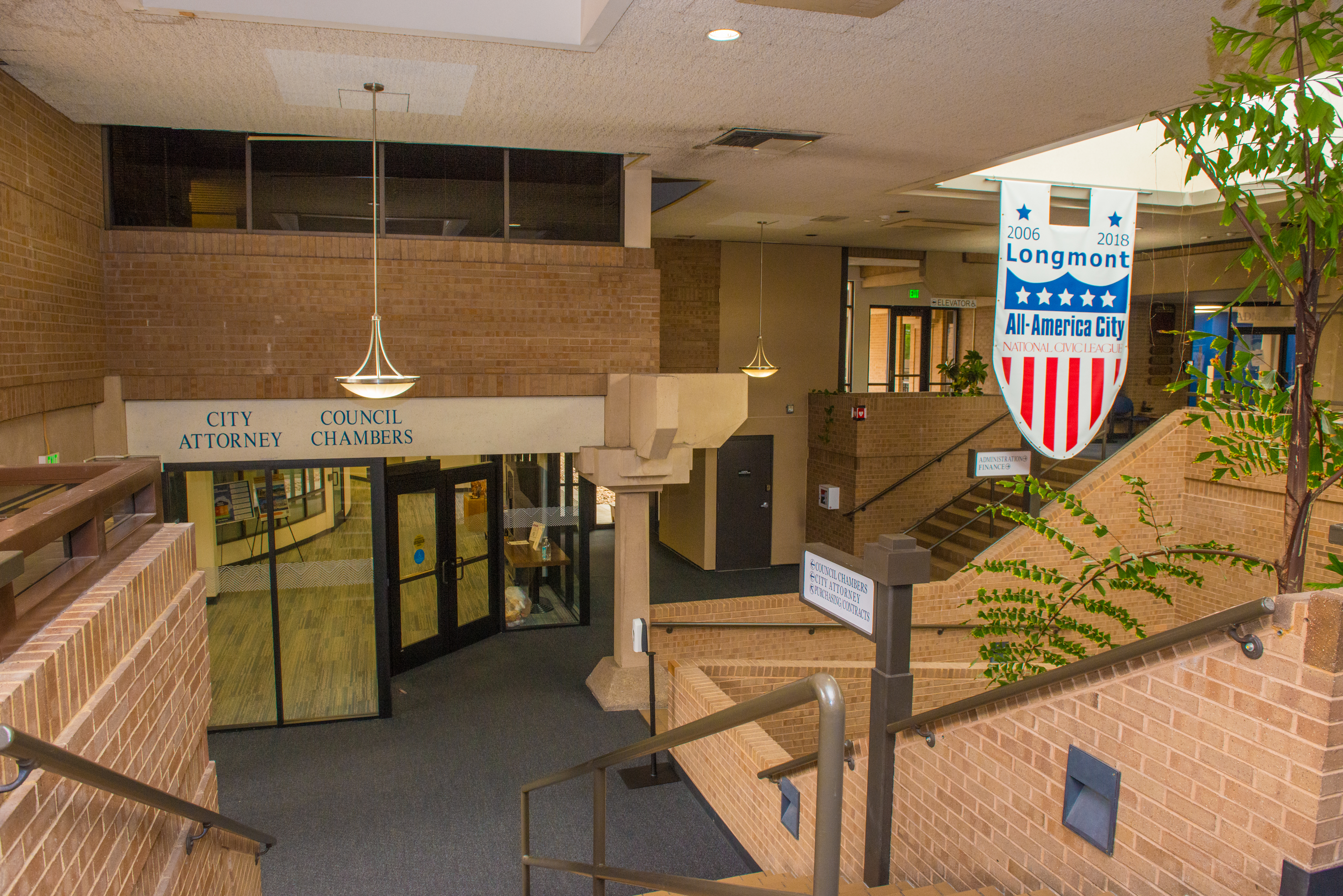 View of City Council Chambers. Sign reads "City Attorney and City Council Chambers"